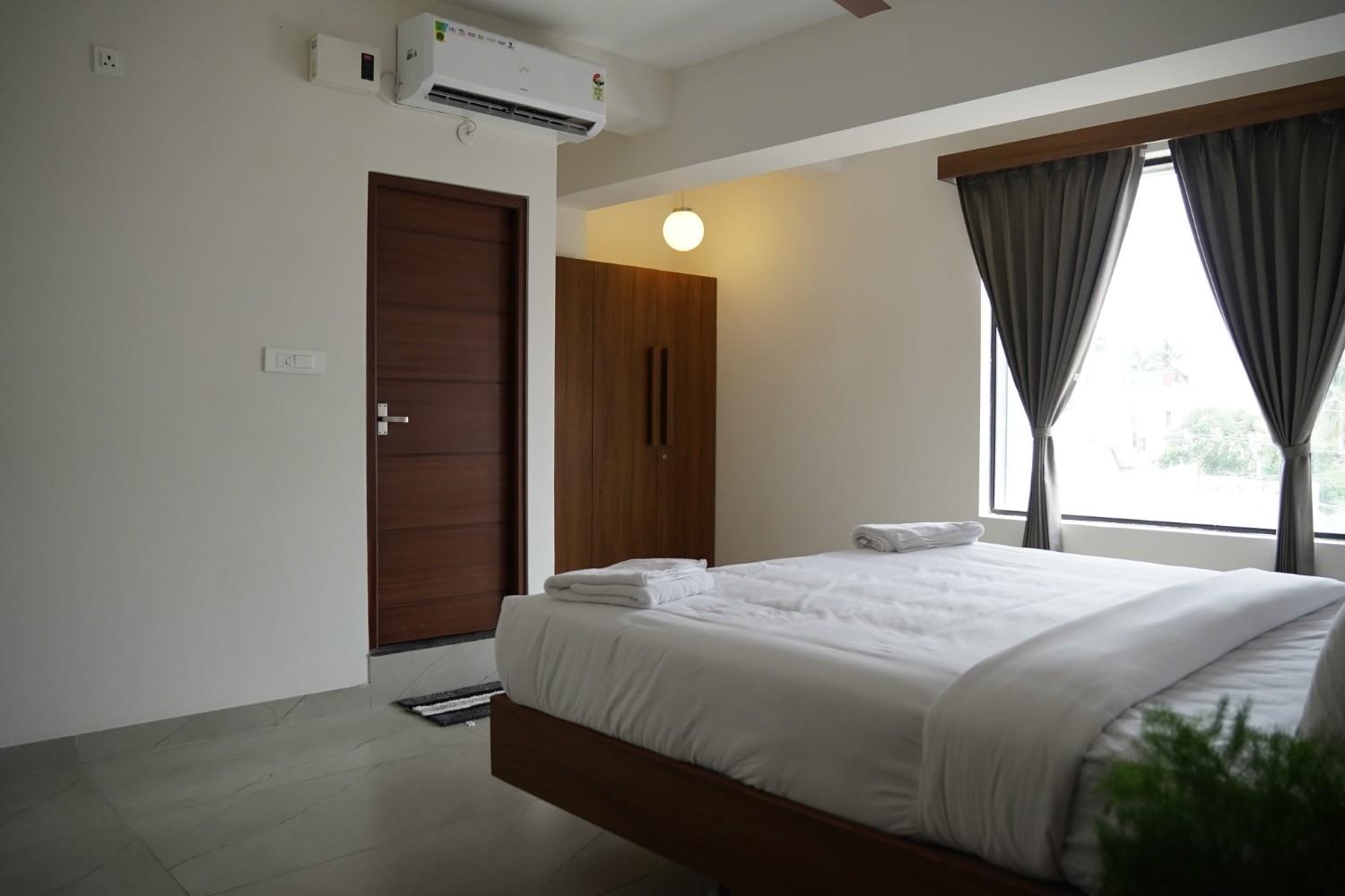Man sitting on a stone on the lake
