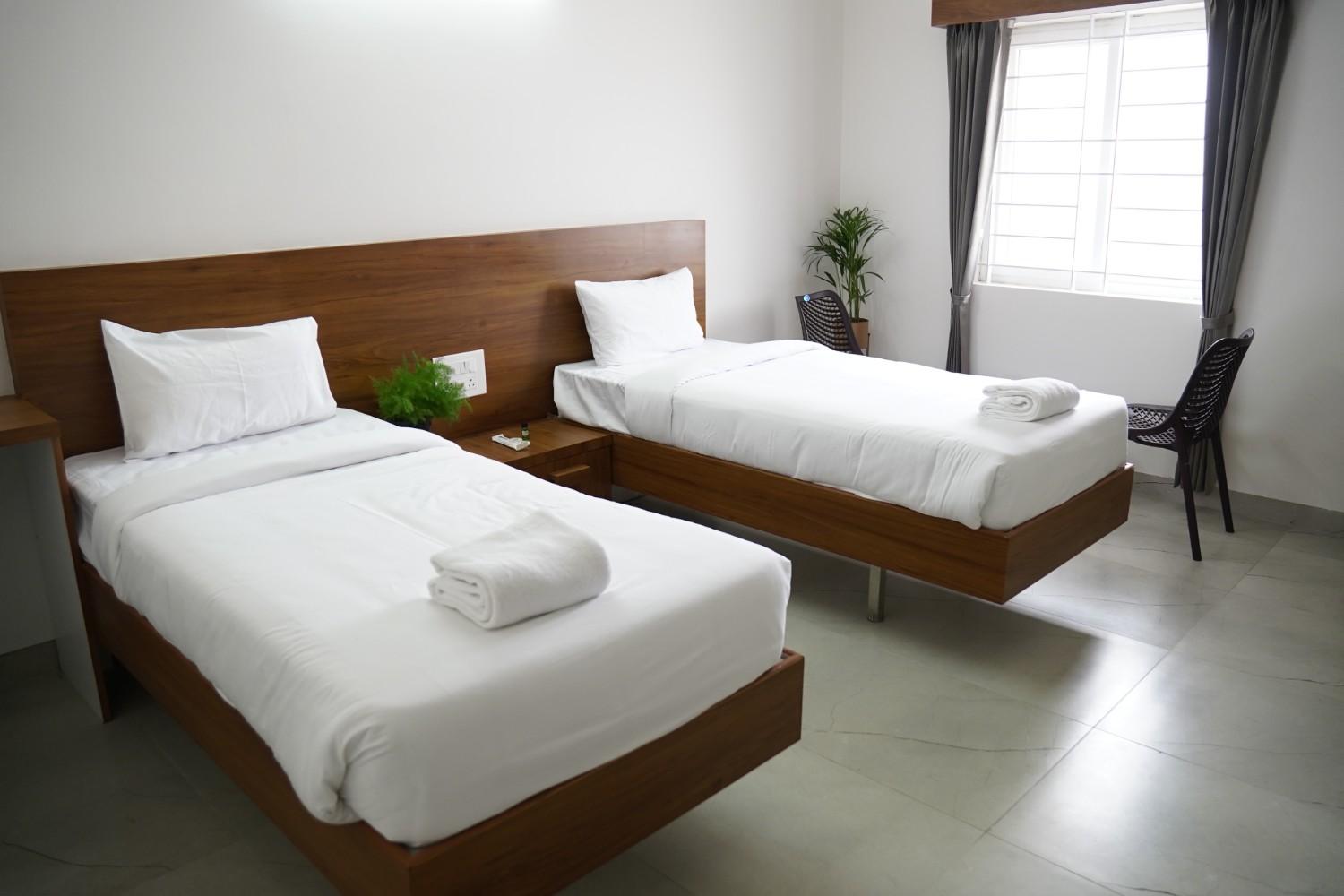 Man sitting on a stone on the lake